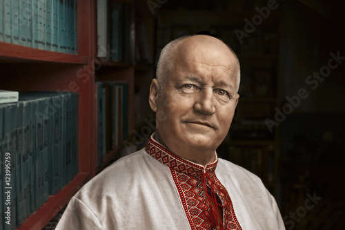 Portrait of a man in the Ukrainian national shirt -  background photo