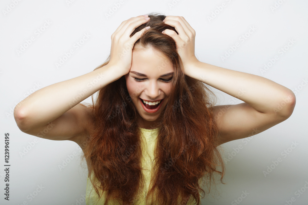 Young cute smiling blond girl