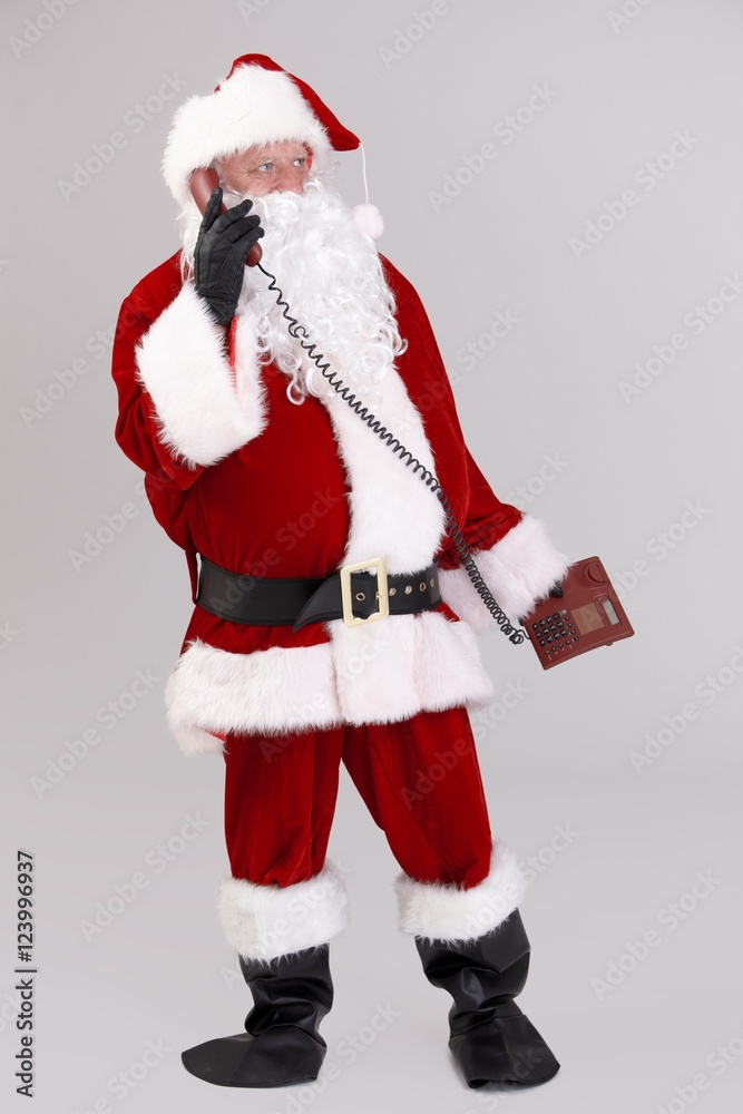 Full size photo of Santa talking on phone Full size photo of Santa talking on phone
