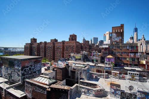 NEW YORK CITY - SEPTEMBER 25, 2016: Overlooking rooftops painted with a lot of graffiti on the buildings near Manhattan Bridge