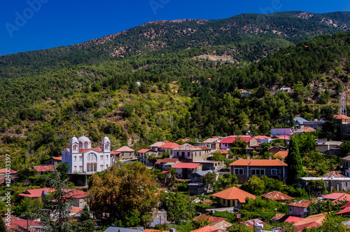 White Christian Orthodox church in the mountain village photo