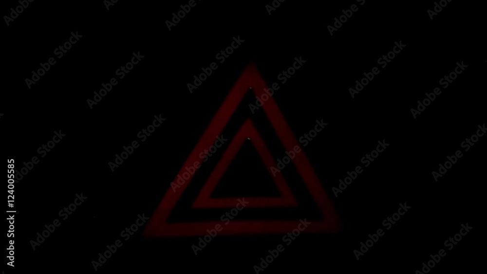 The symbol of an emergency stop of the car lights on a black background The symbol of an emergency stop of the car lights on a black background