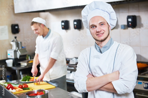 cook chef Portrait in restaurant kitchen