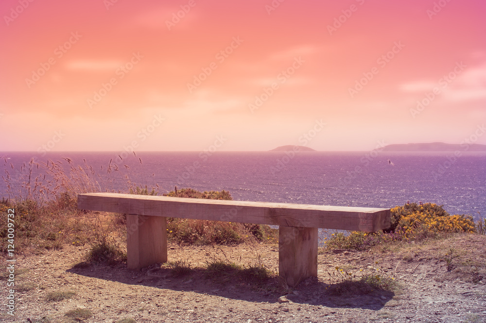 wooden bench at sunset