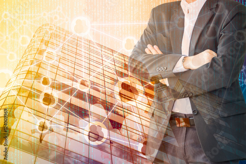 Smart Building and Internet of Things concept. Double exposure of Business man, office building and abstracy digital connection background.