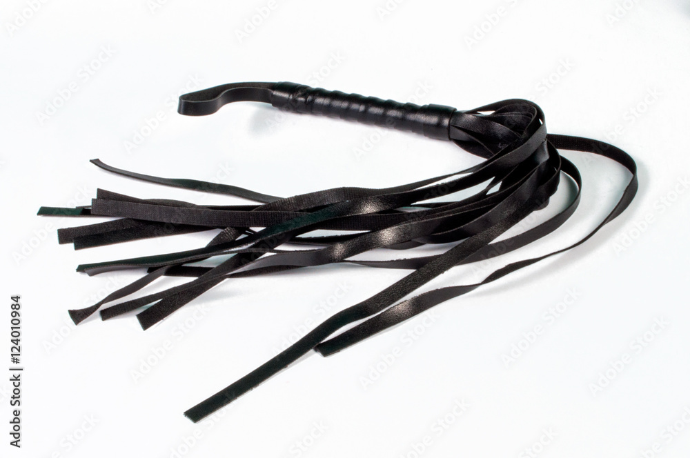 Black leather BDSM lash on white background
Black leather BDSM lash on white background