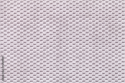 Gray background from soft fleecy fabric closeup. Texture of textile macro