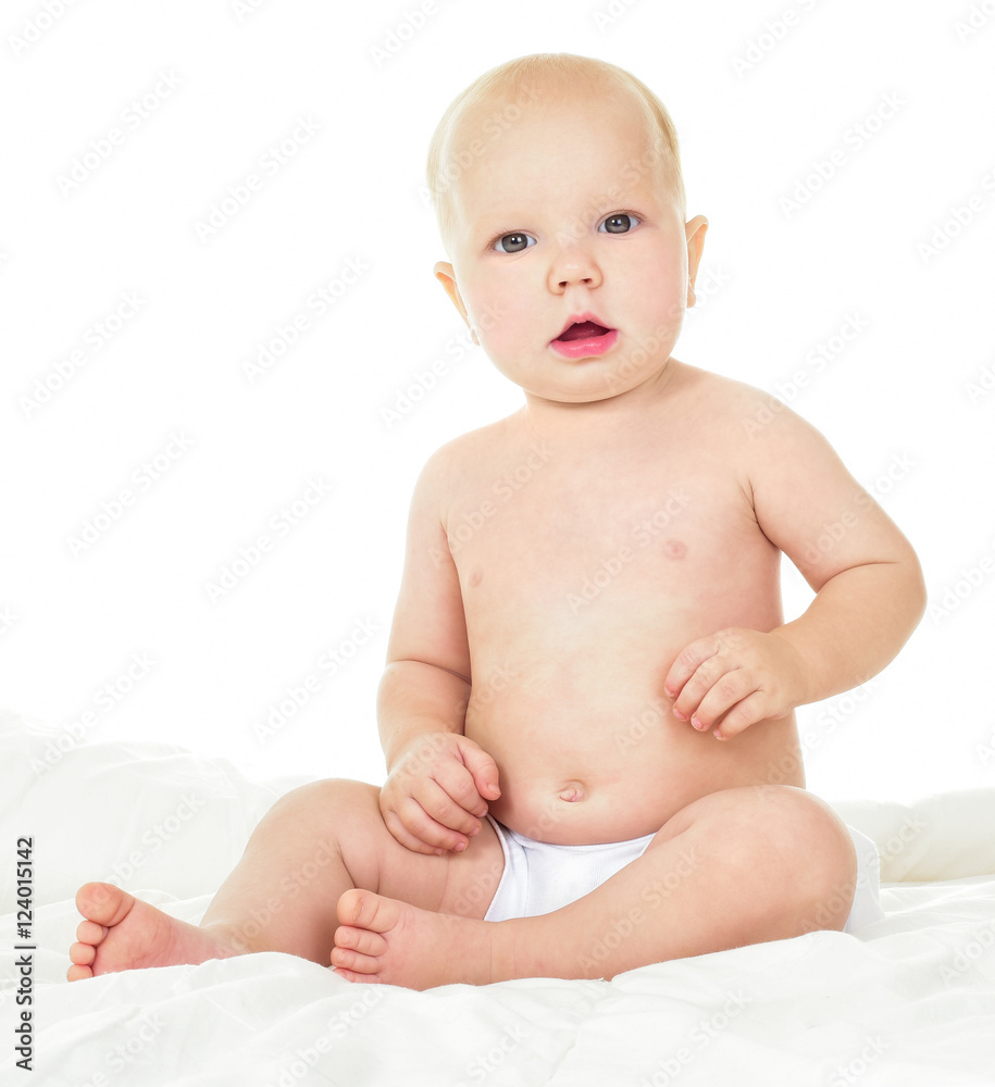 Beautiful smiling baby sitting. One, isolated on white. Beautiful smiling baby sitting. One, isolated on white.