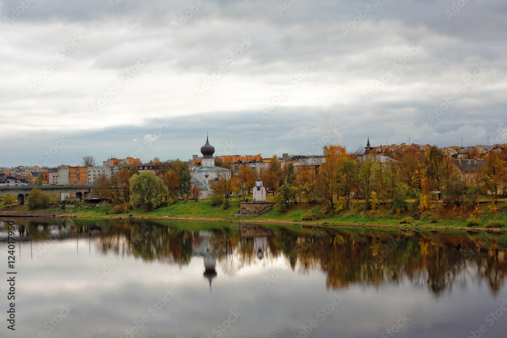 Old church on the river bank of Pskov, Russia. Orthodox temple in the ancient city.