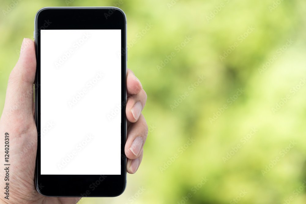 Man holding smartphone with blank mockup screen.