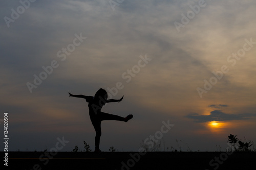 Silhouette girls on holiday. she is happy to be running and jump