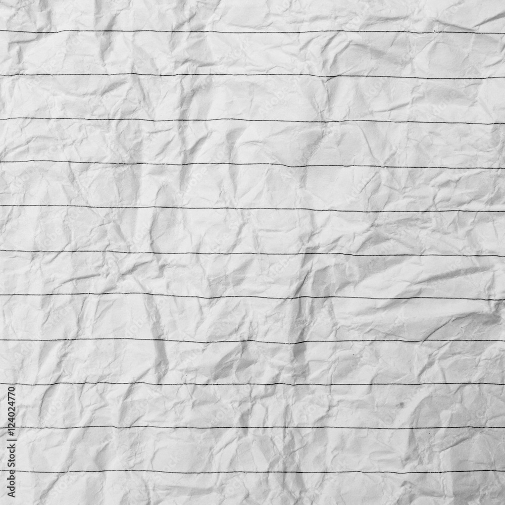 Crumpled sheet of lined paper or notebook paper Crumpled sheet of lined paper or notebook paper