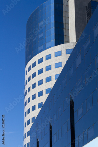 Round office building with concrete and glass windows