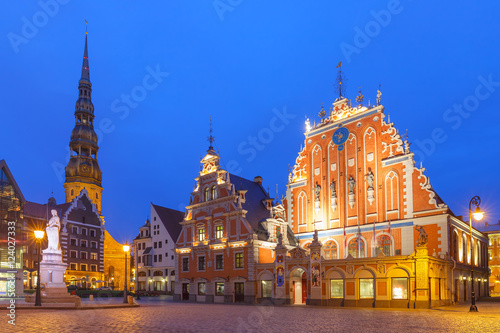 City Hall Square with House of the Blackheads and Saint Peter church in Old Town of Riga at night, Latvia