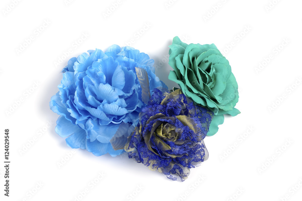 Floristics - blue artificial flowers on white background Floristics - blue artificial flowers on white background