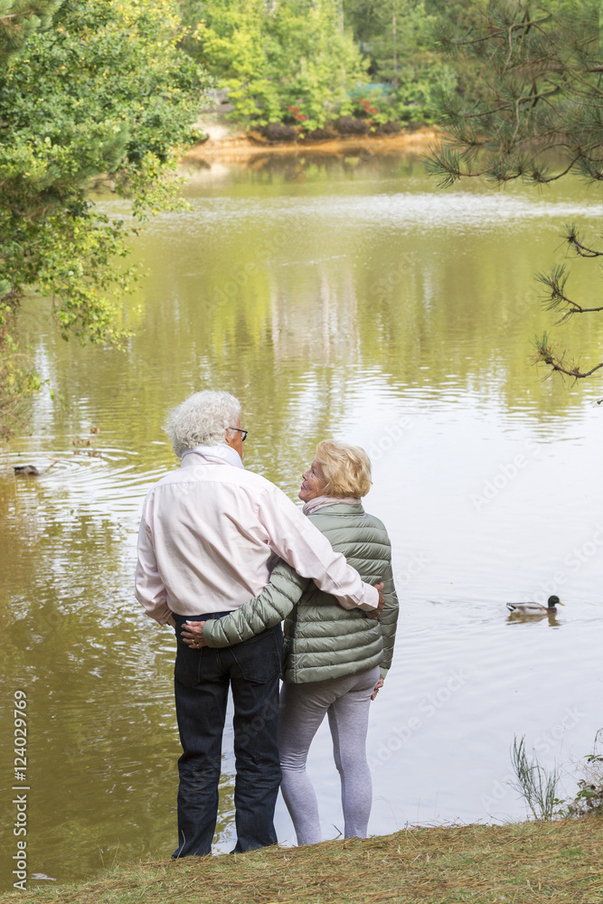 Senior couple in autumn park