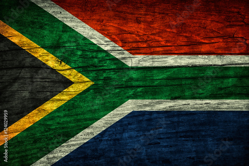 Vintage flag of South Africa on wooden surface