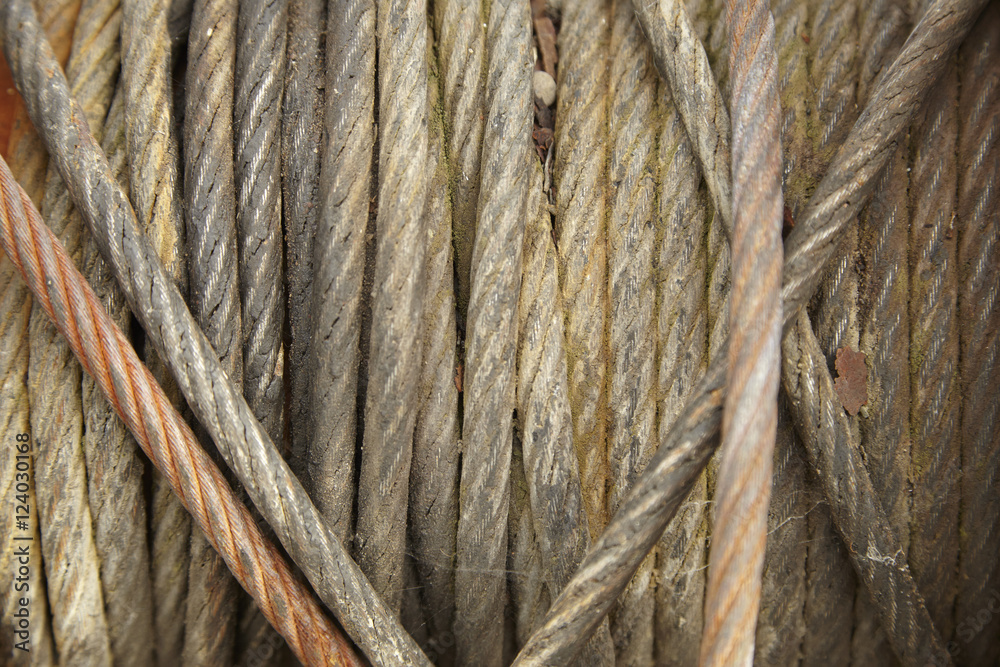 Φωτογραφία A whole page of heavy fishing rope on metal spool background texture