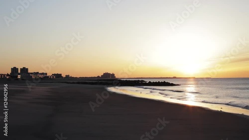 Sunrise seascape at Rockaway Beach, New York. photo