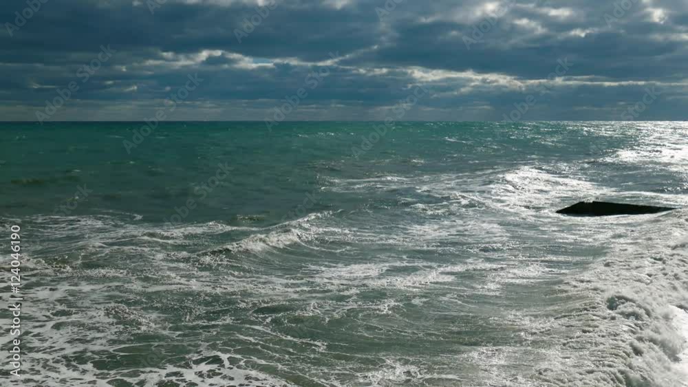 Seascape on cloud background at sunset / Panoramic seascape on background of dramatic clouds at sunset