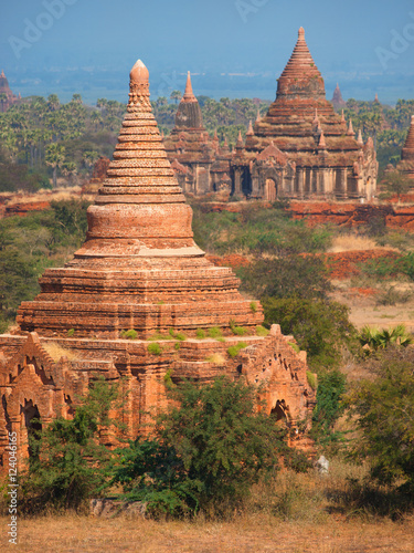 Ancient pagodas valley in Bagan, blue sky in background