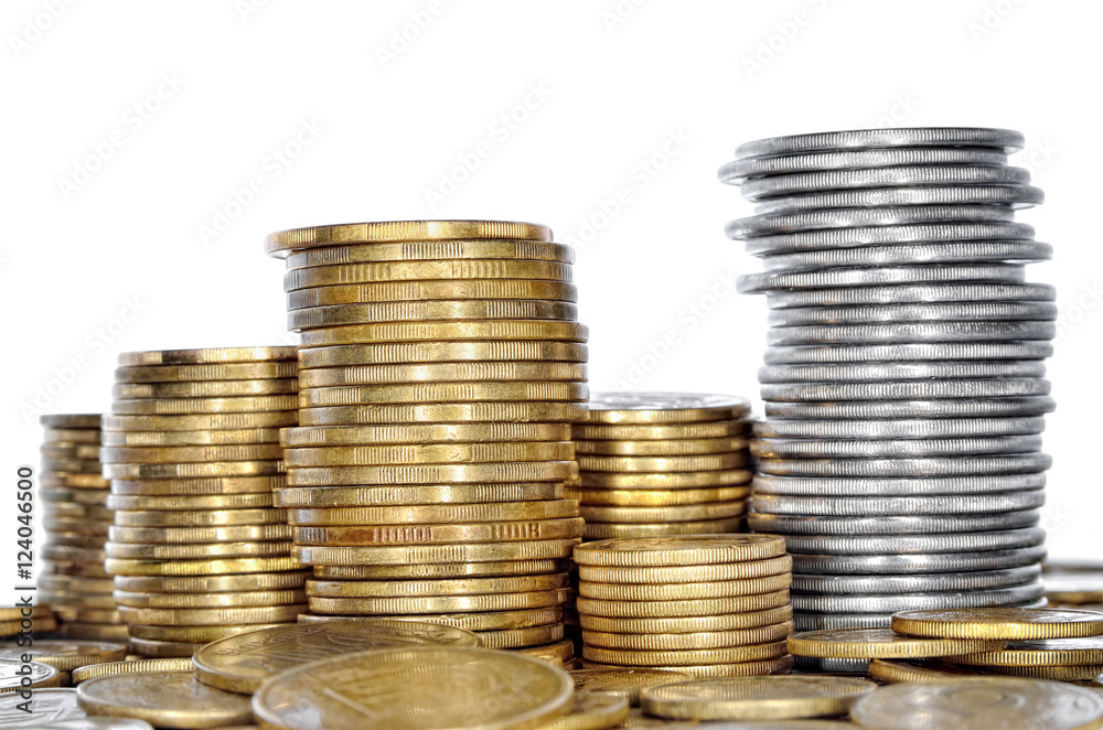 Many coin bank of yellow and white metal. Cash closeup. Many coin bank of yellow and white metal. Cash closeup.