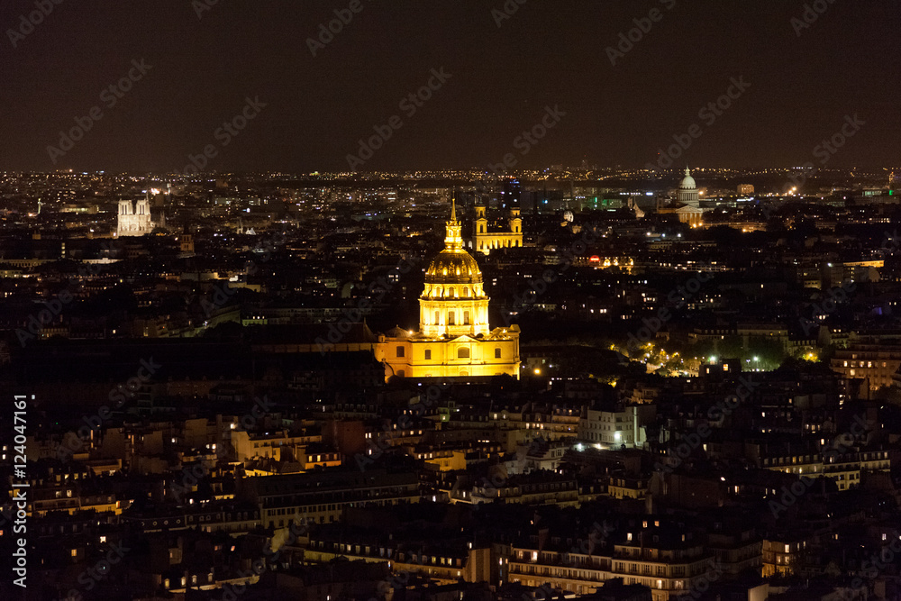 View from the Eiffel Tower at night. Les invalides building in t