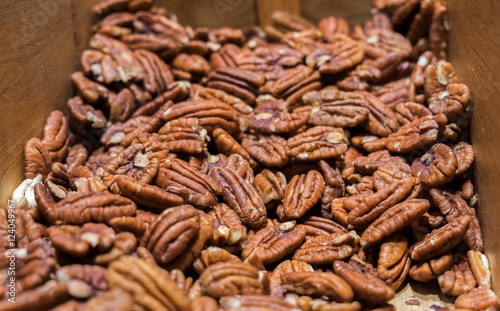 Pecan nuts for sale in wooden box