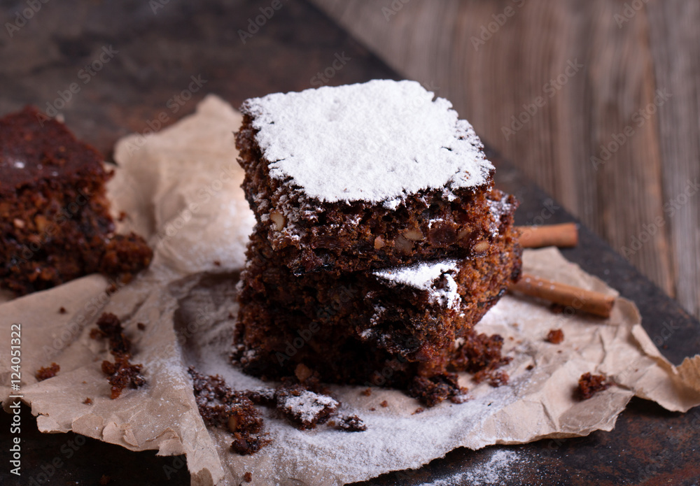 Fototapeta premium Pieces of Christmas chocolate cake
