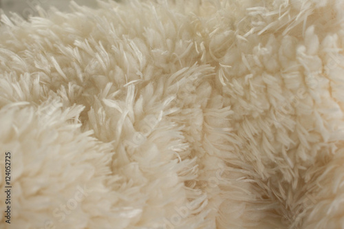 White, beige, milky fluffy background of soft material