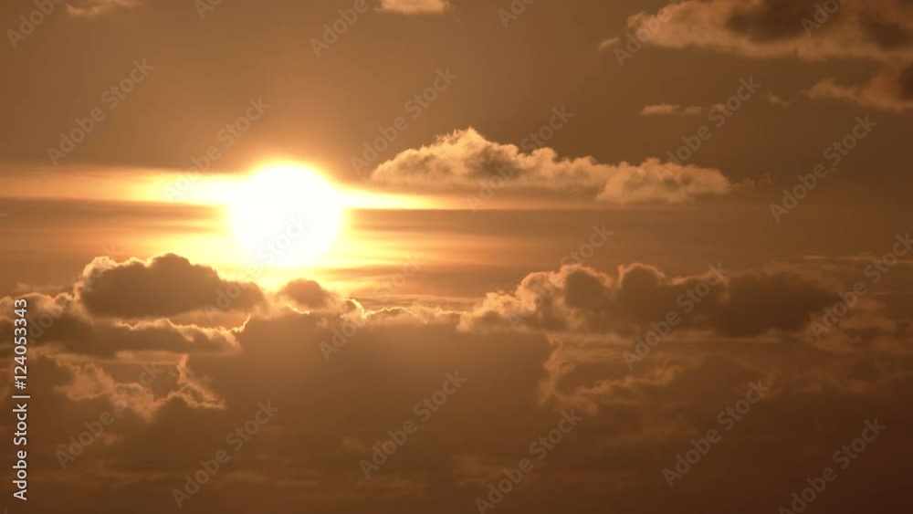 Sun drops behind beautiful cloudscape, time lapse day to night. Reverse for sunrise effect. Sun drops behind beautiful cloudscape, time lapse day to night. Reverse for sunrise effect.