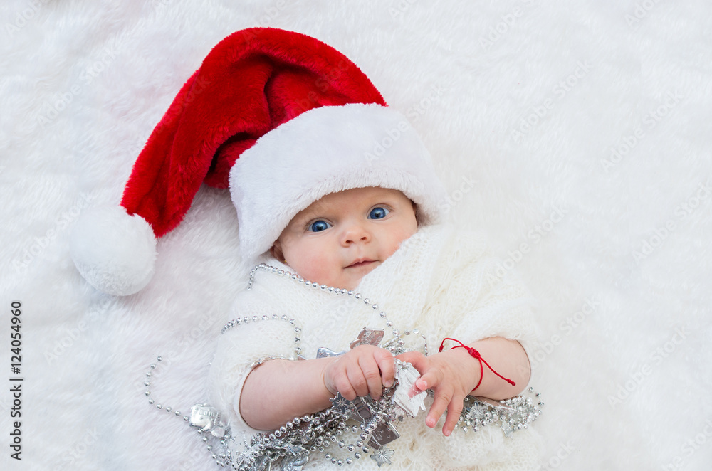 Cute newborn Christmas baby in Santa hat Cute newborn Christmas baby in Santa hat
