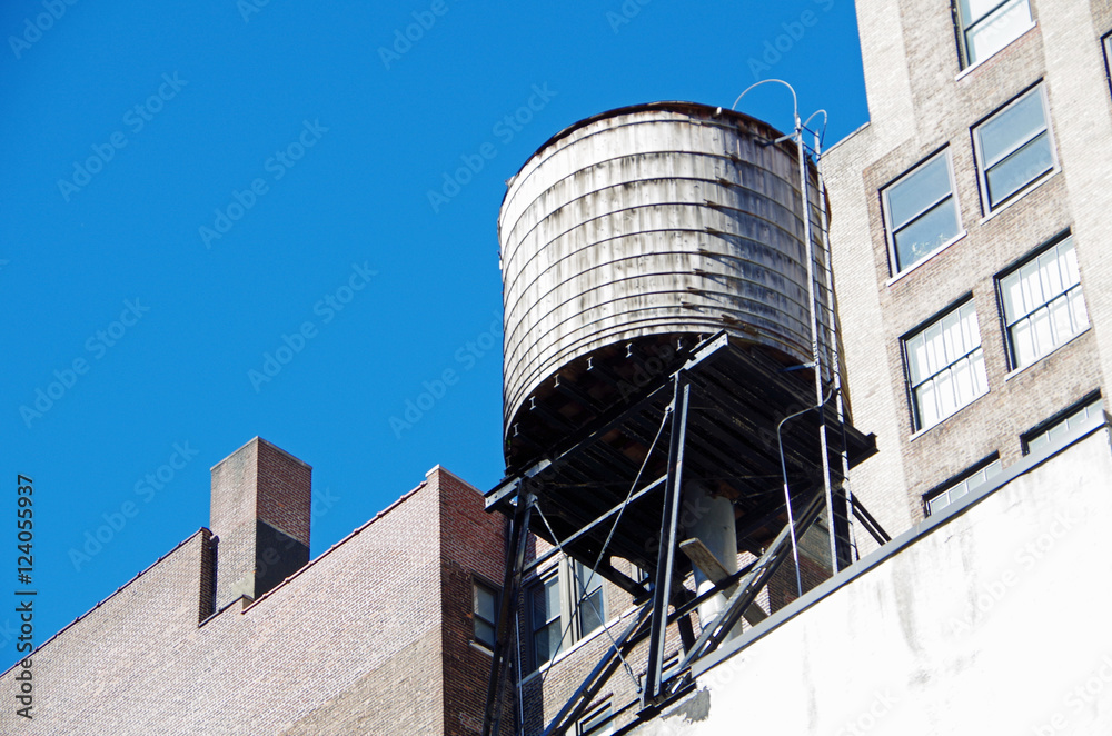 New York City urban water towers and rooftops New York City urban water towers and rooftops