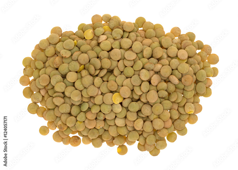 Organic green lentils on a white background top view. Organic green lentils on a white background top view.