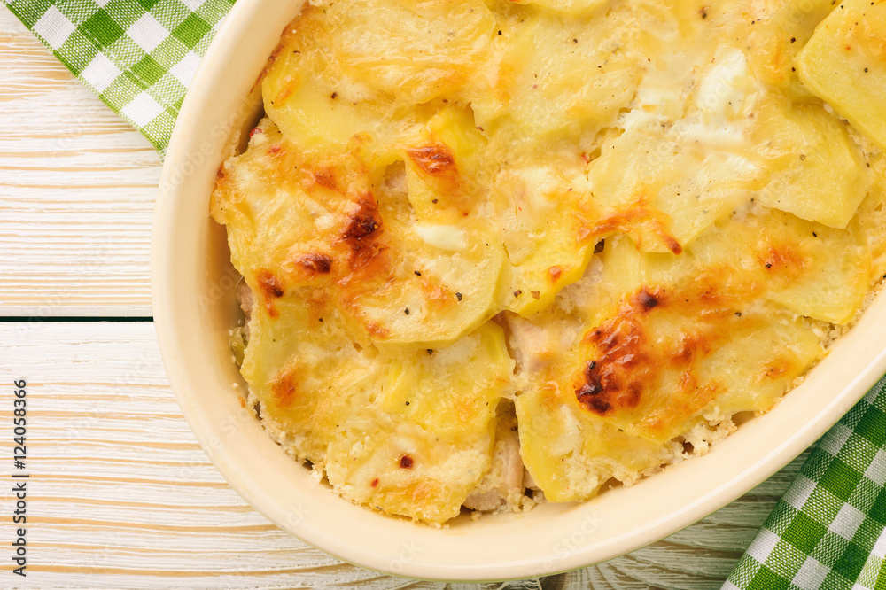 Casserole with chicken, potatoes, leek and cheese. Casserole with chicken, potatoes, leek and cheese.