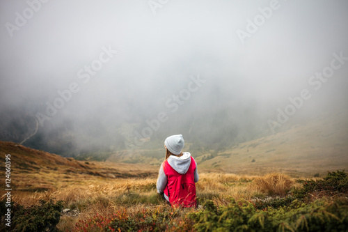 Girl in Beautiful Mountain Fog Landscape