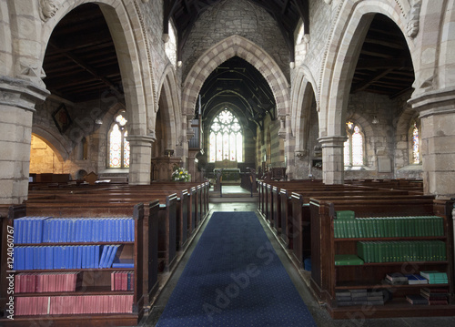Centre Aisle And Shelves Of Hymn Books Inside A Church; Northumberland, England