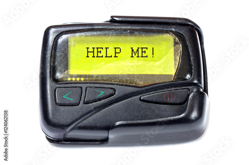 Old pager on a white background photo