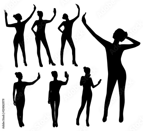 Girl taking selfie silhouettes