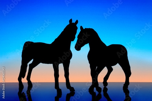 horses on the background of dawn