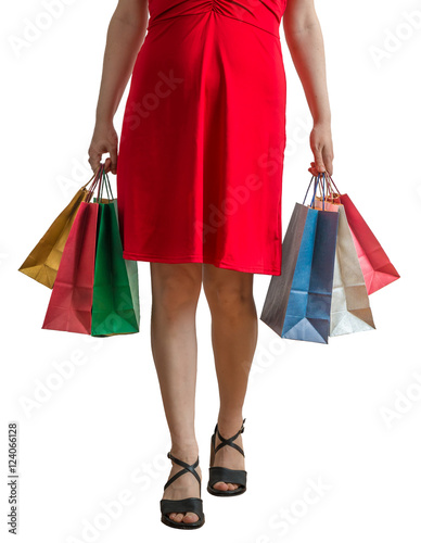 Shopping concept. Young woman holds many shopping bags. Isolated on white background.