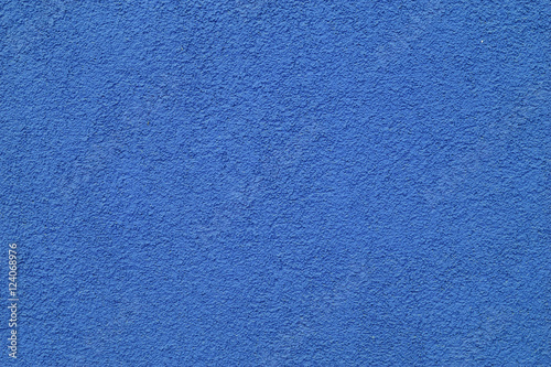 The texture of the blue wall