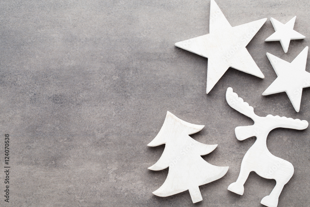 Christmas background. White tree decorations on a gray backgroun