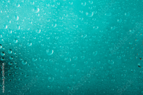 Texture of water drops in blue background