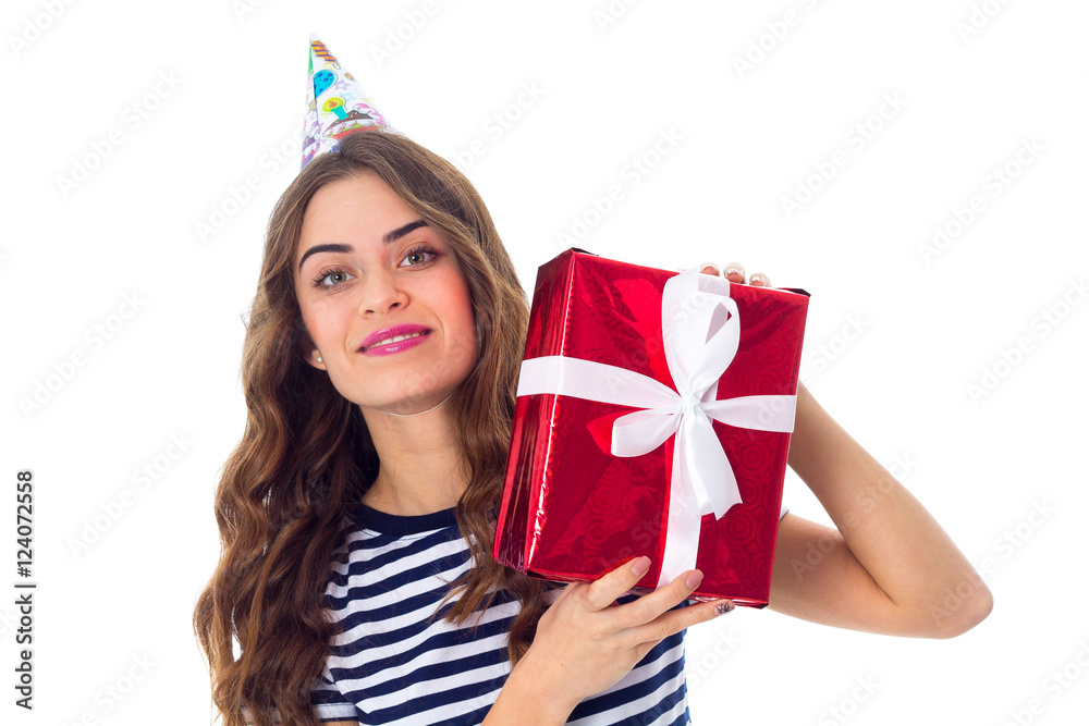 Woman in celebration cap holding a present 