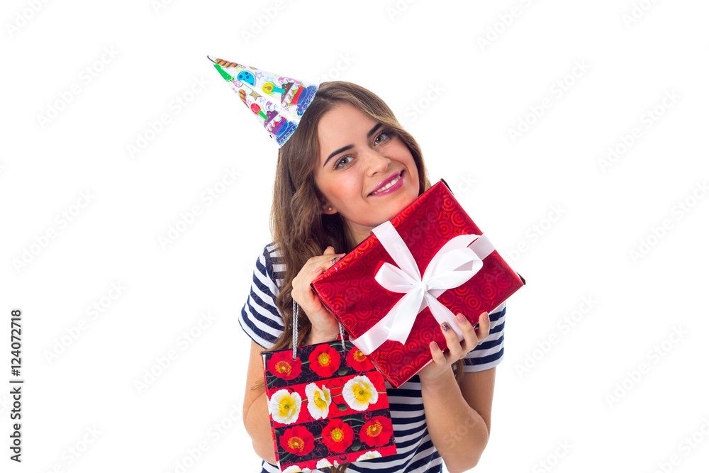Woman in celebration cap holding presents Woman in celebration cap holding presents
