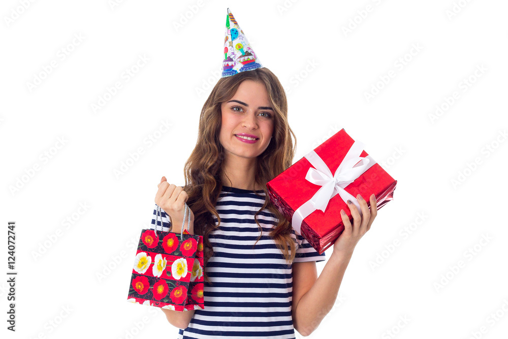 Woman in celebration cap holding presents Woman in celebration cap holding presents