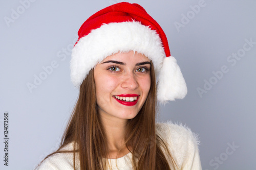 Woman in red christmas hat