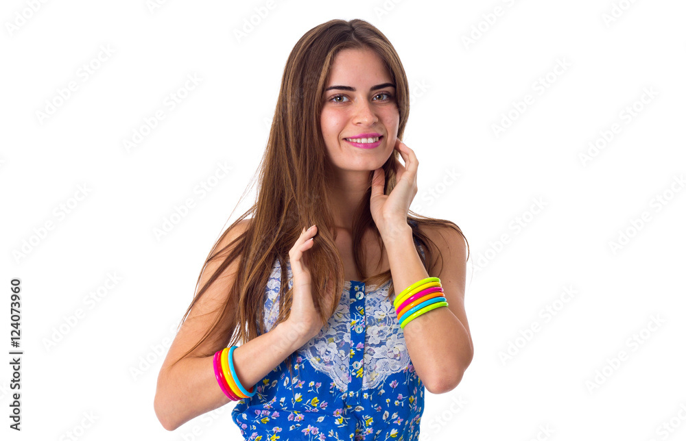 Young woman fixing her hair Young woman fixing her hair