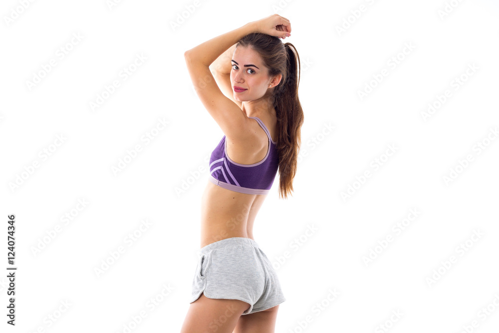 Athletic woman holding hands on her head Athletic woman holding hands on her head